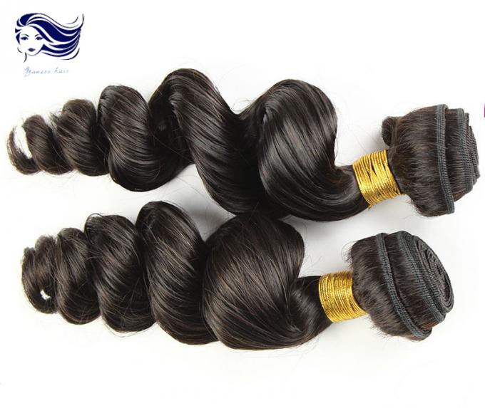 24 cheveux noirs naturels de Vierge de Remy de Brésilien de cheveux de Vierge de la catégorie 7A de pouce